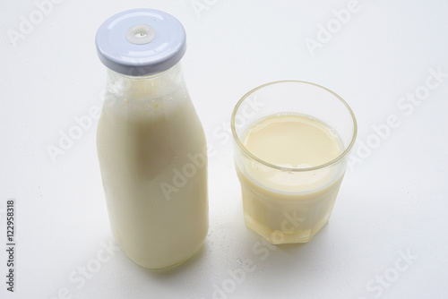 Soy milk in glass with soybeans. Food for health.