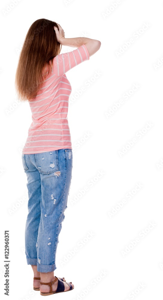 Back view of shocked woman. Back view of shocked woman.