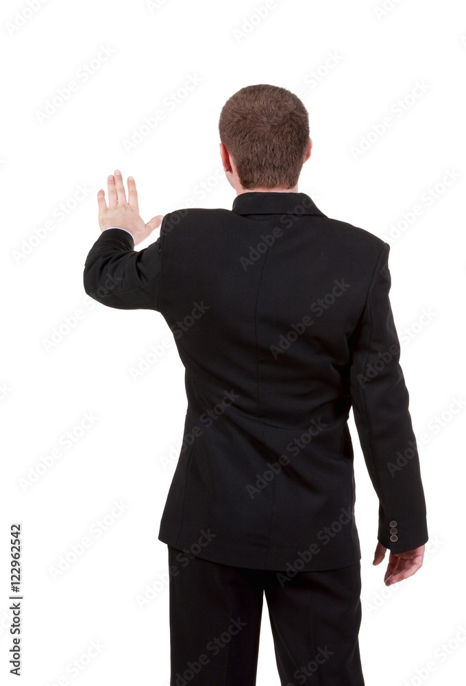 back view of Businessman . Young guy in black suit watching. Isolated over white background. Rear view people collection. backside view of person. back view of Businessman . Young guy in black suit watching. Isolated over white background. Rear view people collection. backside view of person.