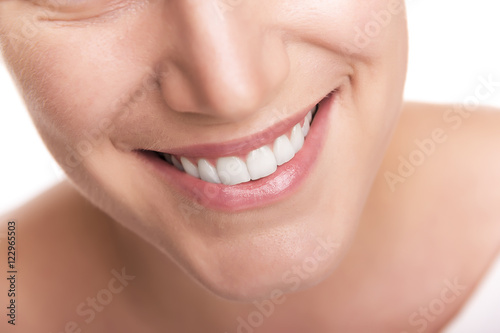 Beautiful wide smile of young woman.