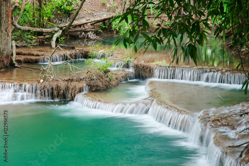 Green landscape with green waterfall , Erawan waterfall , Loacat