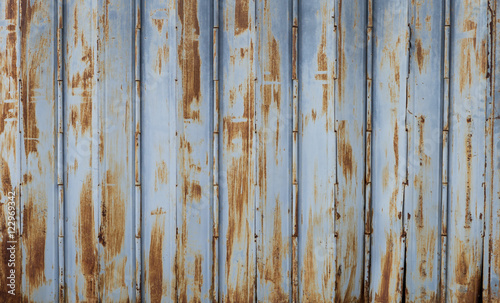 Old rusty metal gate background
