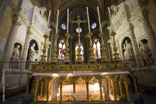 High altar of Santa Maria Sopra Minerva Basilica, with the tomb of Santa Caterina da Siena and the  Medici or Choir chapel on the background photo