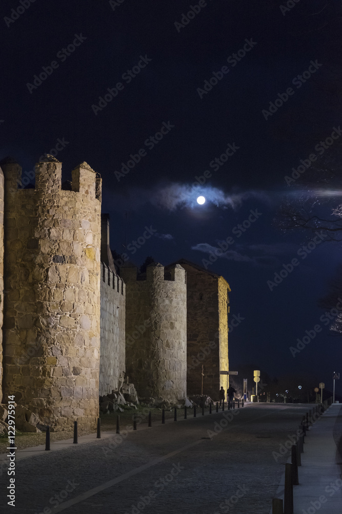 Perfectly preserved medieval walled town the night of the city of Avila in Spain views
