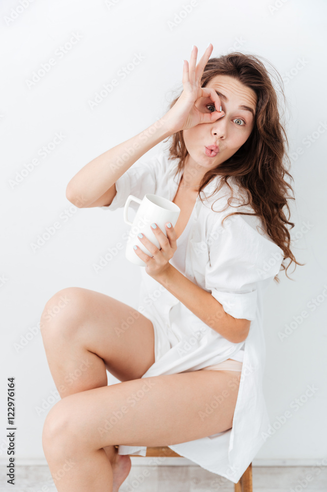 Close up portrait of a beautiful girl holding tea cup Close up portrait of a beautiful girl holding tea cup