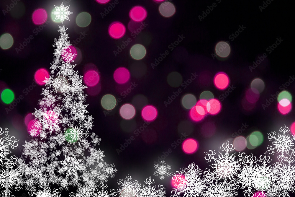 White snowflakes christmas tree at the pink bokeh background White snowflakes christmas tree at the pink bokeh background
