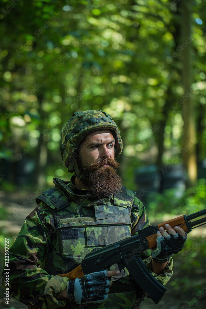 Bearded soldier in the forest