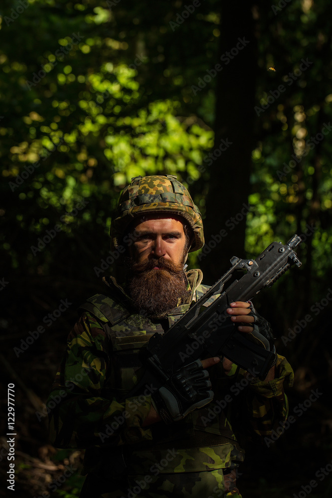 Fototapeta premium Bearded soldier in the forest