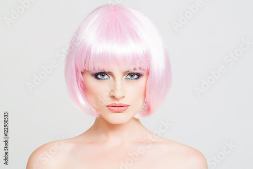 young pretty girl in pink wig