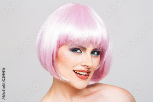 young pretty girl in pink wig