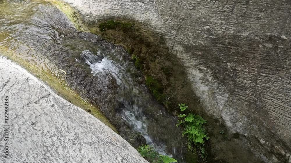Pure fresh water stream in mountain forest Pure fresh water stream in mountain forest