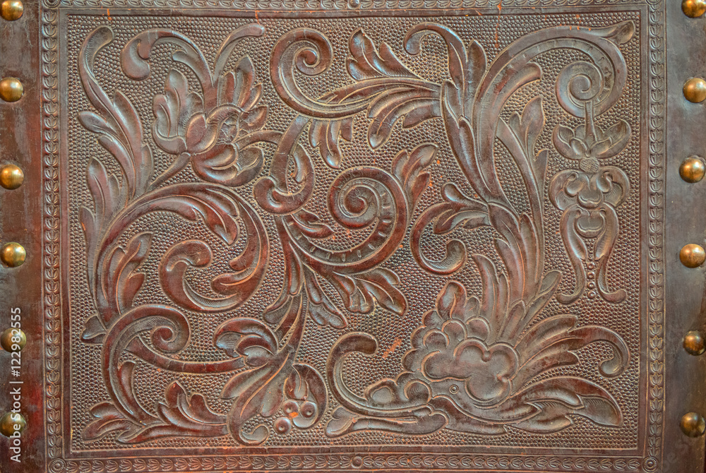 Vintage floral pattern on leather