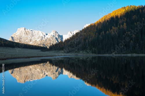 Fototapeta Naklejka Na Ścianę i Meble -  Reflections on water, autumn panorama from mountain lake