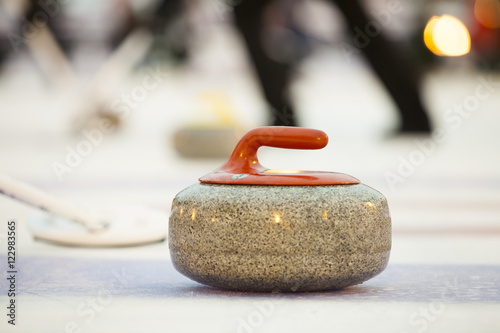 Curling stones on ice 