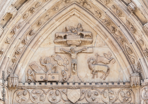 Christian relief  of the 14th century  on the facade of a church