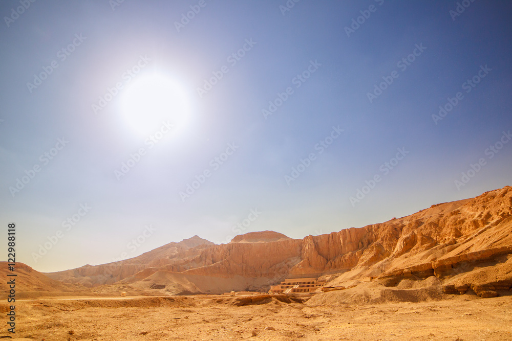 Naklejka premium The ancient temple among the desert