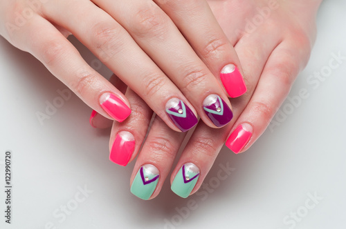 multicolored manicure pink, mint, green, purple moon with crystals and stripes 