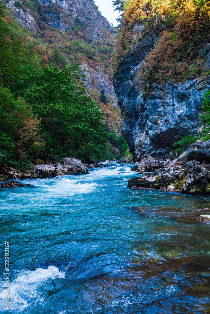 Beautiful view of mountain river in summer. Mountain river in th Beautiful view of mountain river in summer. Mountain river in th