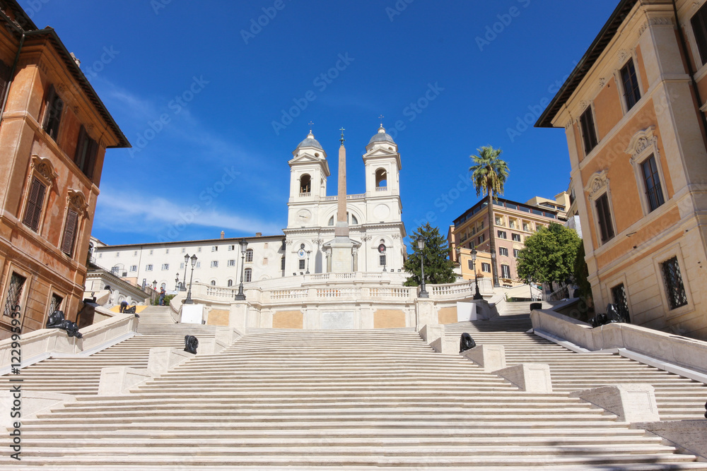 Spanish Steps in Square of Spain, Rome, Italy at morning with blue sky in the unusual situation without people