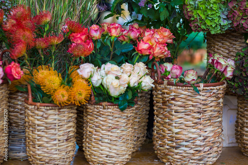 Roses in rustic  basket