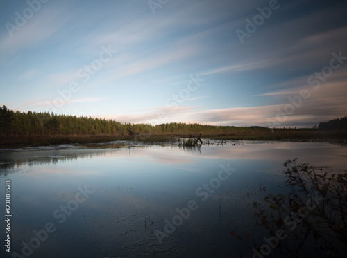 Lake in sweden photographed with long exposure  cloud reflections in the water 