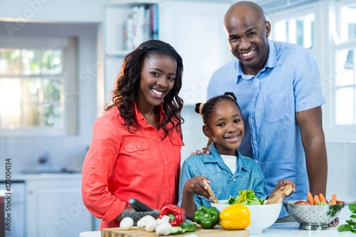 Happy family preparing food