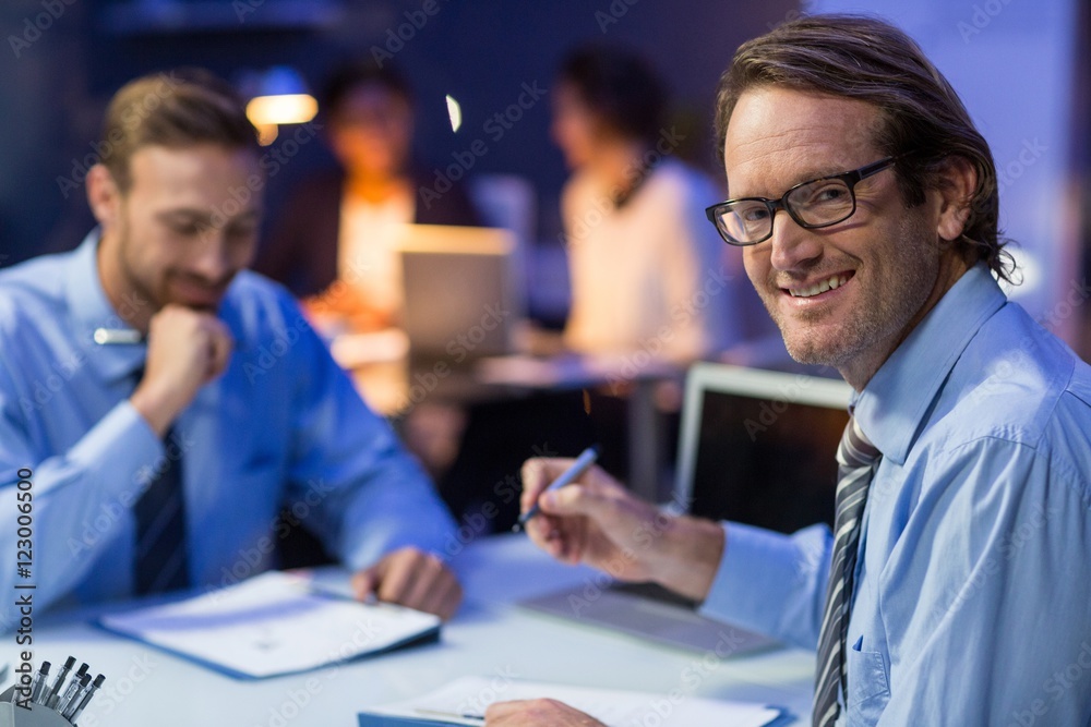Businessman preparing document in conference Businessman preparing document in conference