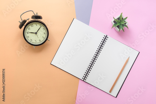 Top view of notebook and stationery