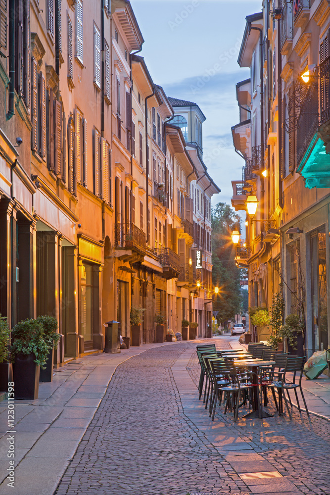 CREMONA, ITALY - MAY 24, 2016: The street Via Solverino in morning dusk.