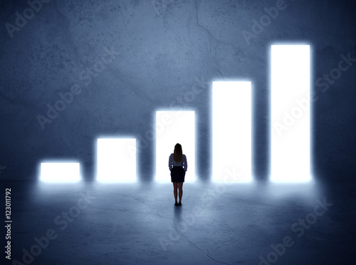 woman standing in front of a chart