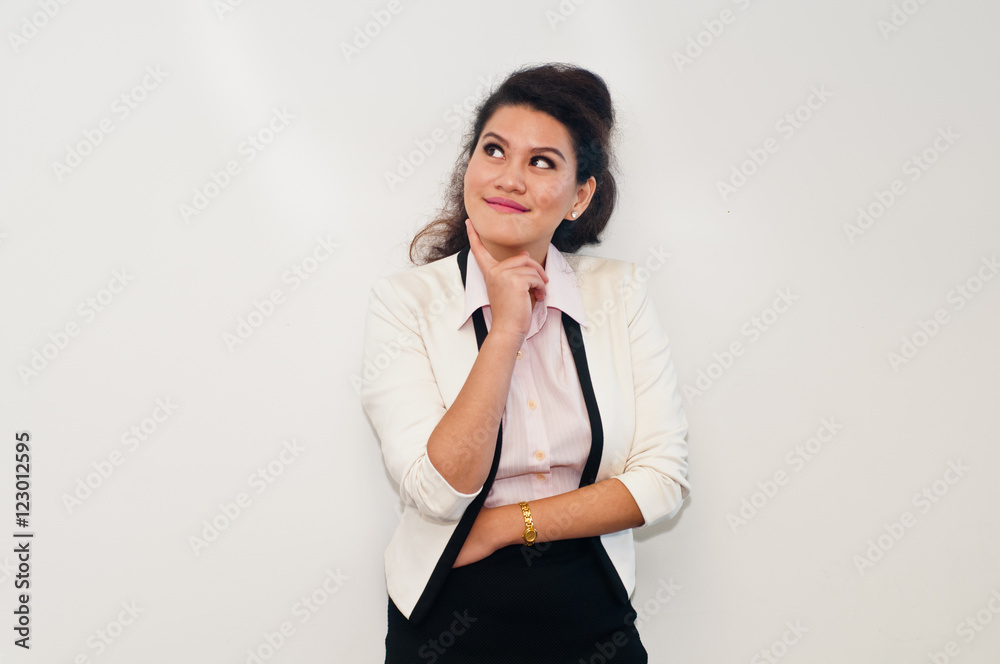 Business woman is thinking standing on white background Business woman is thinking standing on white background