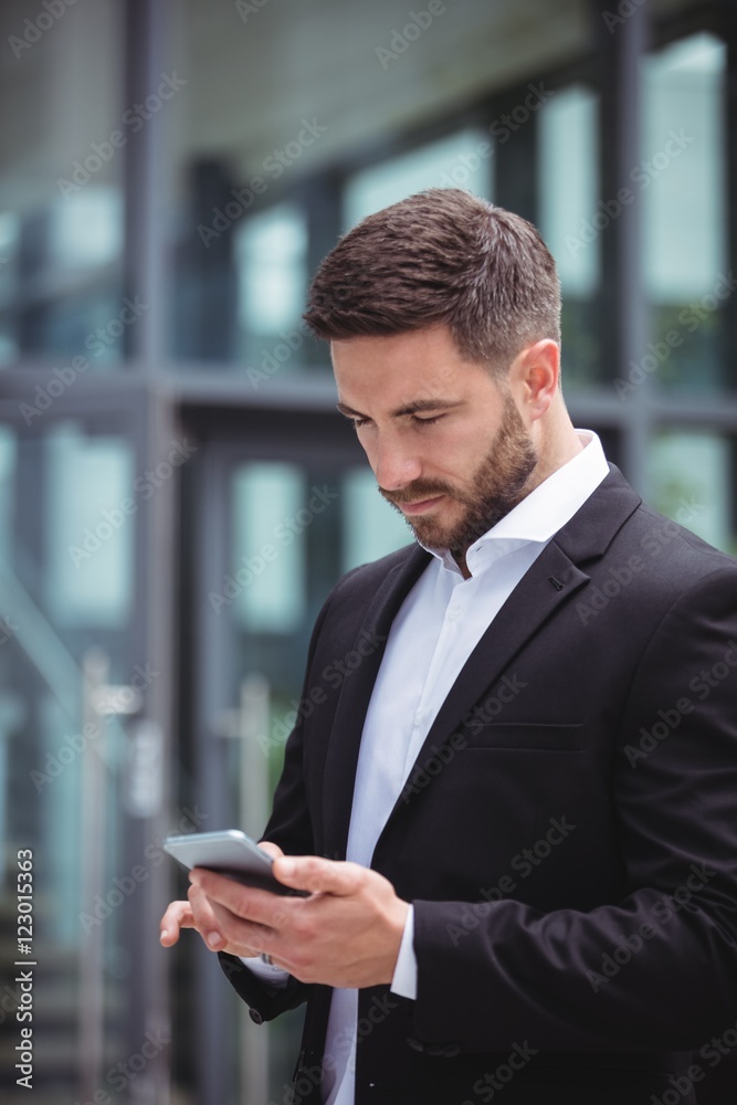 Businessman talking on mobile phone Businessman talking on mobile phone
