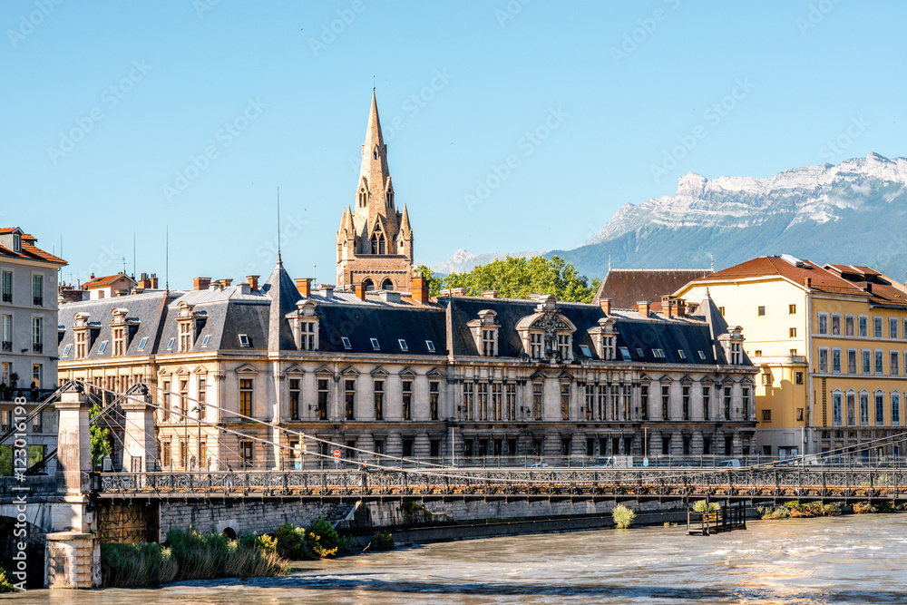 Morning cityscape view with mountains, river and bridge in Grenoble city on the south-east of France