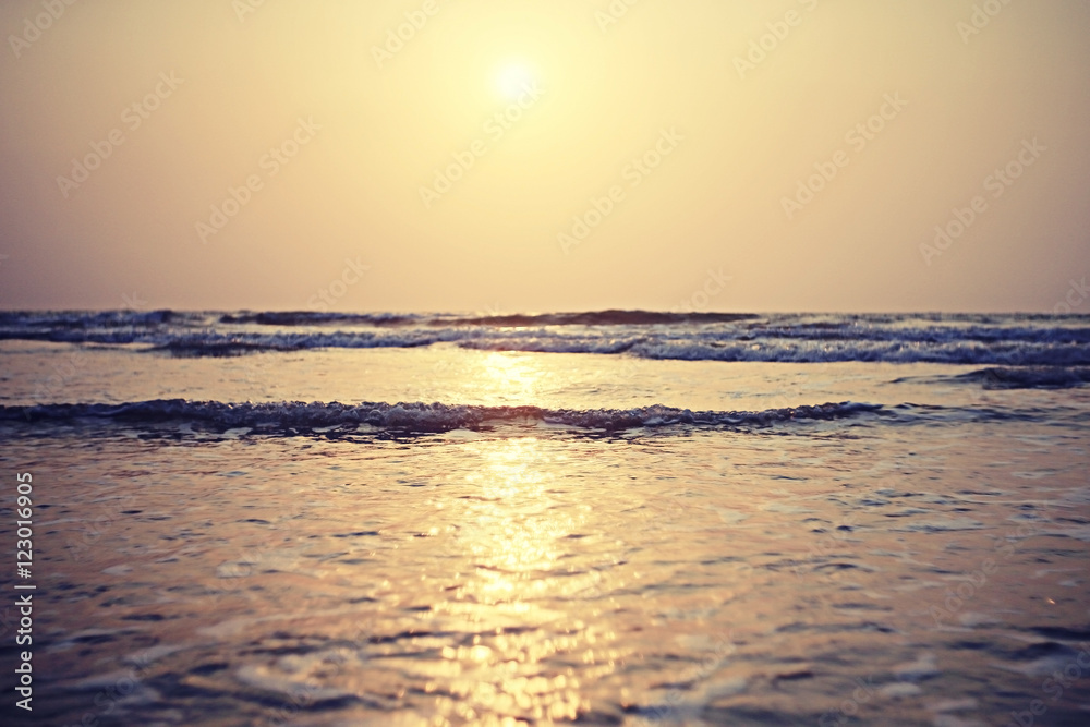 Naklejka premium sunset on sea texture water summer sun