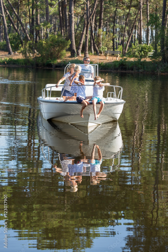 family enjoying a summer day on a boat family enjoying a summer day on a boat