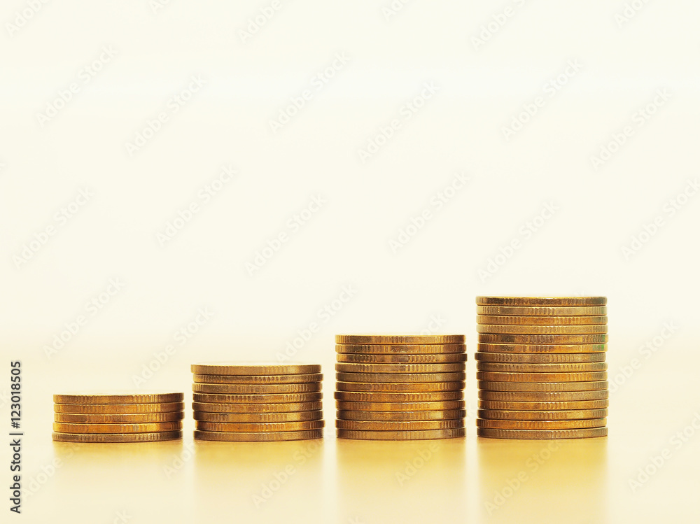 Stack of golden coins growing up stack. Growth business and financial concept. Stack of golden coins growing up stack. Growth business and financial concept.