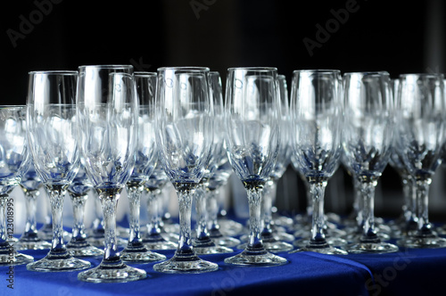 Many wine glasses on a party table