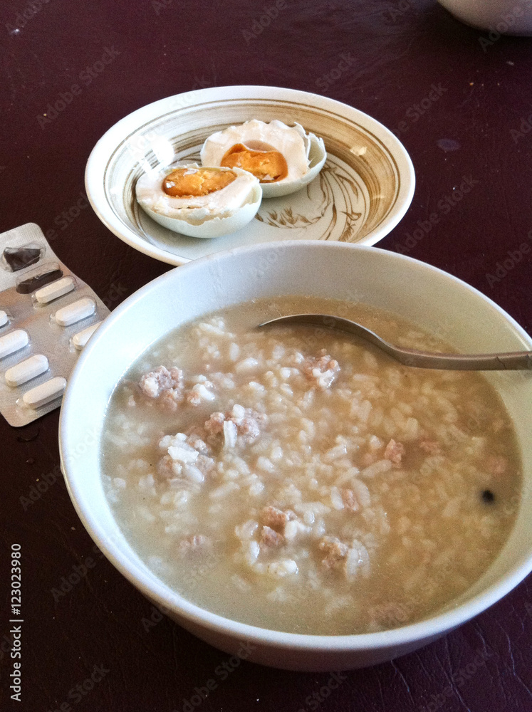 Pork boiled rice with salted eggs for sick patient Pork boiled rice with salted eggs for sick patient