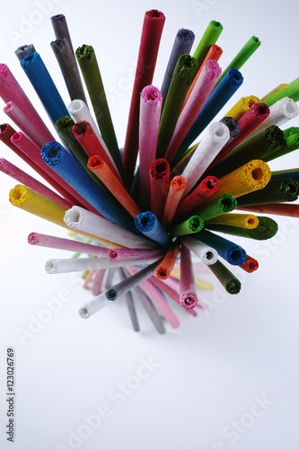 Colorful wooden sticks on white background