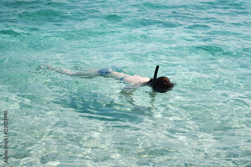 Snorkeling in clear water.