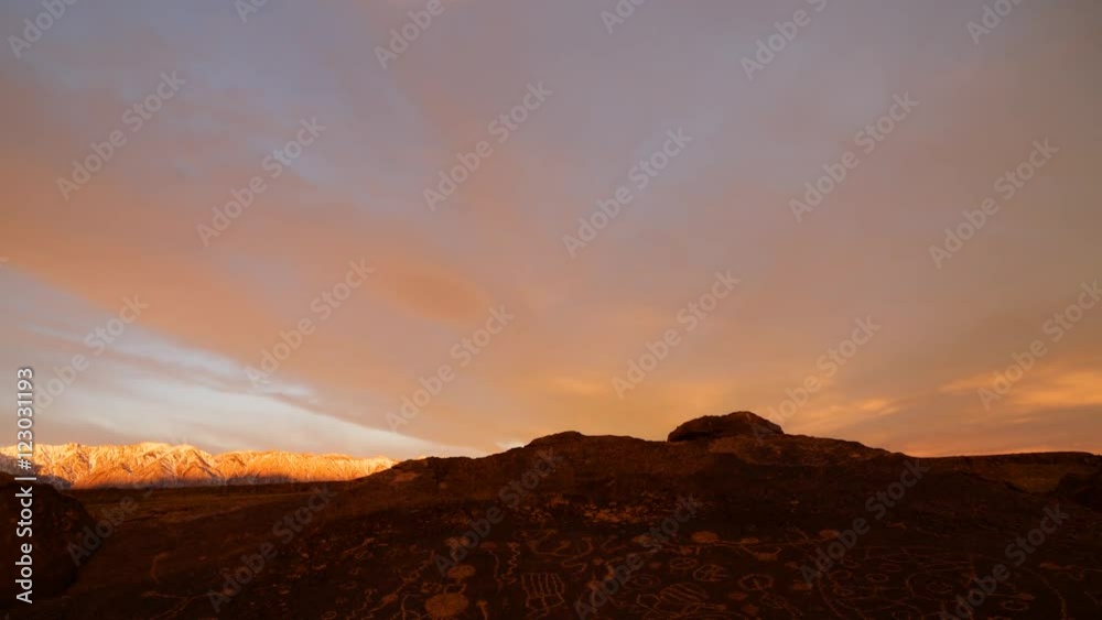 Time lapse with tilt down motion of morning glow over Native American Petroglyphs in Eastern Sierra, California Time lapse with tilt down motion of morning glow over Native American Petroglyphs in Eastern Sierra, California