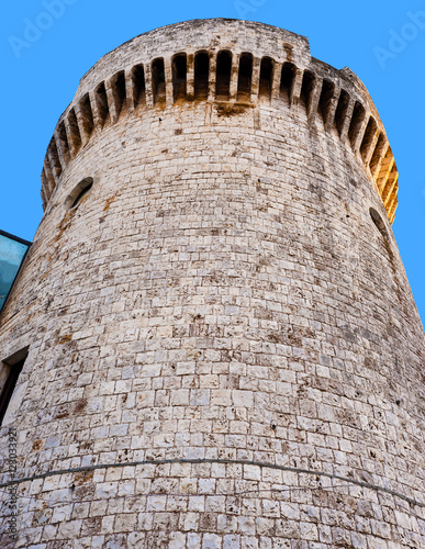 detail Norman tower of the castle of Conversano, Puglia - Italy photo