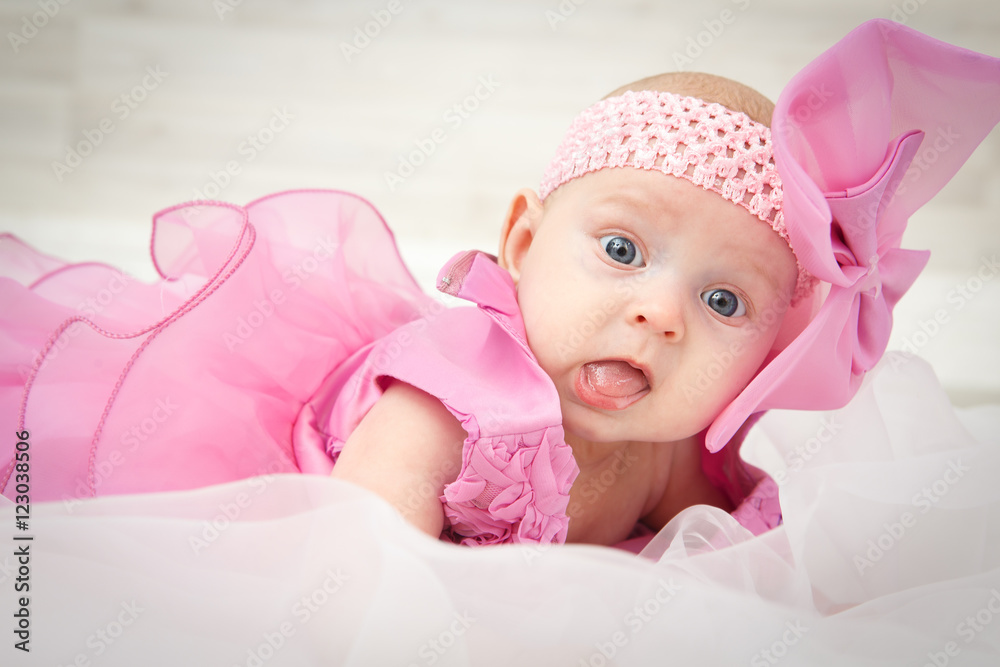 Portrait of a beautiful little baby girl in pink Portrait of a beautiful little baby girl in pink