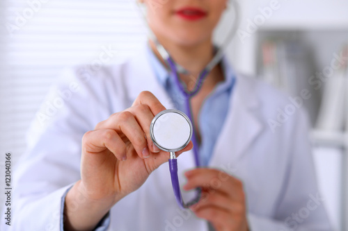 Doctor with a stethoscope in the hands