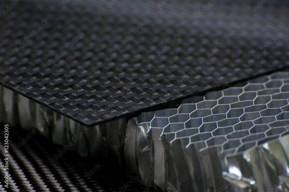 Carbon fiber composite material background - obrazy, fototapety, plakaty 