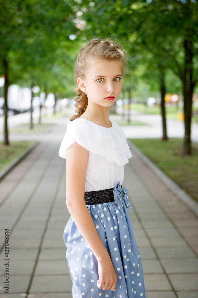 Portrait of a beautiful young girl in the Park Portrait of a beautiful young girl in the Park