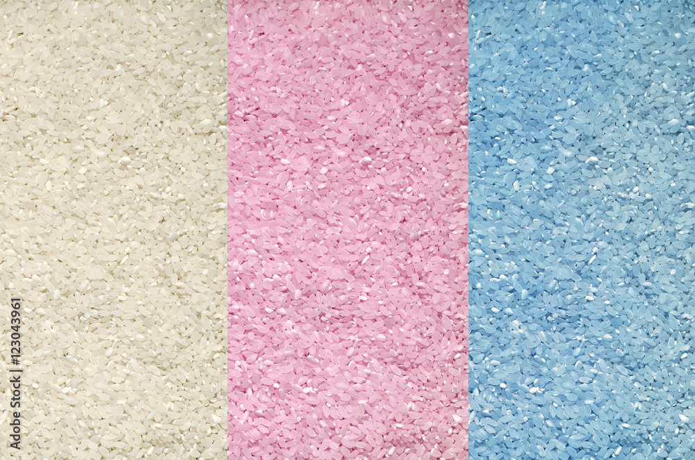 Fototapeta premium Textured background of colorful rice grains on the surface