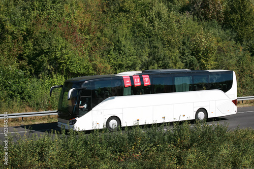 Modern white bus on tour in germany