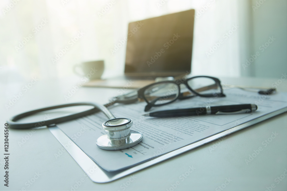 Doctor's desk in evening with no person