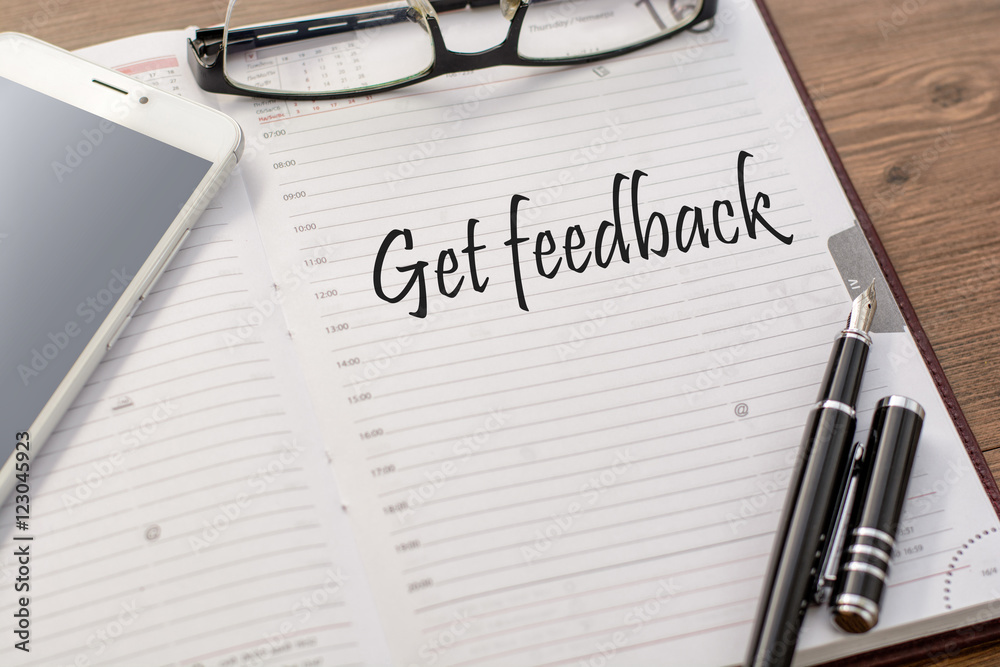 Fototapeta premium Text To do in a notebook (the diary) and a mobile phone, glasses